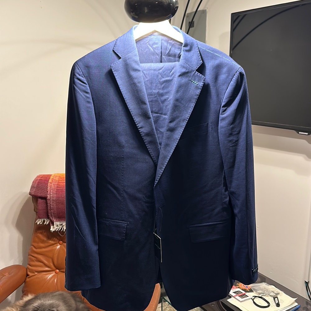 Never been worn, with tags, Peter Millar collection suit. Size 42r